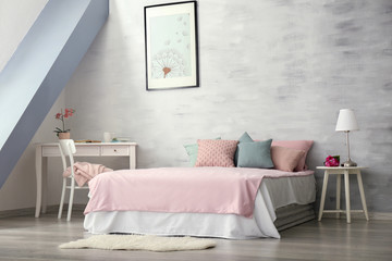 Light room interior with modern bed