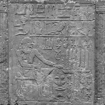 ancient stone relief at Chnum temple in Egypt