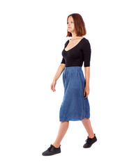 back view of walking  woman.
