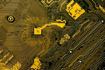 yellow circuit board background of computer motherboard