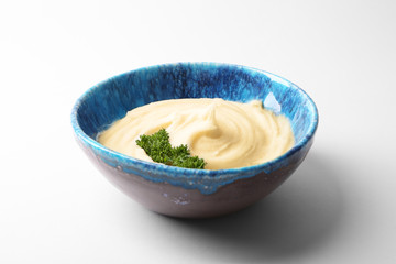 Plate with mashed potatoes on white background