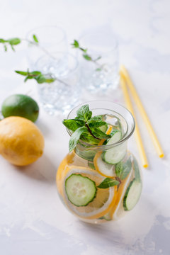 detox cocktails with cucumber and lemon on a light background, healthy lifestyle, fitness drinks