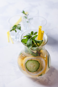 detox cocktails with cucumber and lemon on a light background, healthy lifestyle, fitness drinks, spring avitaminosis, cold prevention