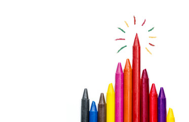 colorful oil pastel crayons on white background, Stand out concept