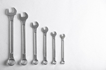 Plumber's tools on light background