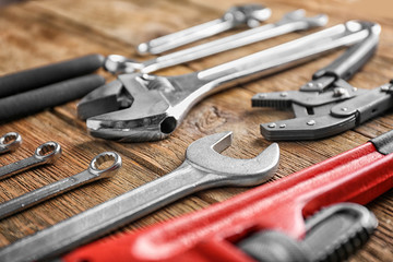 Fototapeta premium Plumber's tools on wooden background
