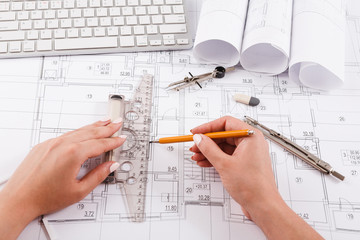 Architect drawing architectural project