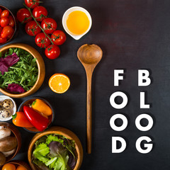 Food blog concept. Organic vegetables for dietary catering on black background