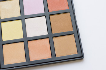 Make Up Beauty Fashion Concept. Daily make up eyeshadow palette on white, close up