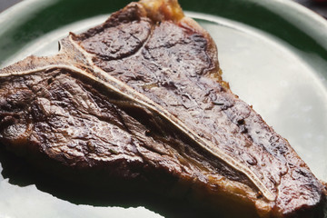 Medium rare Grilled T-Bone Steak closeup