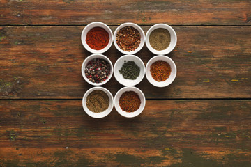 Diverse spices in small cups