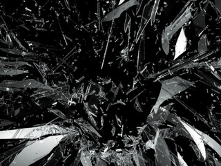 Splitted and damaged glass on black