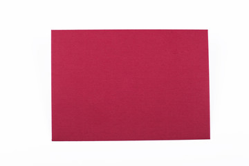 Envelope of garnet color on white background. Isolated. Mockup.