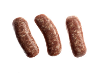 three sausages on white background isolated