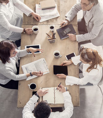 Close working table with workers