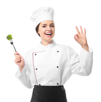 Portrait of female chef on white background