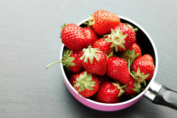 ripe strawberry in a saucepan