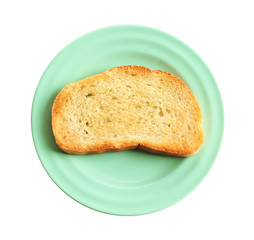 Plate with toasted bread on white background