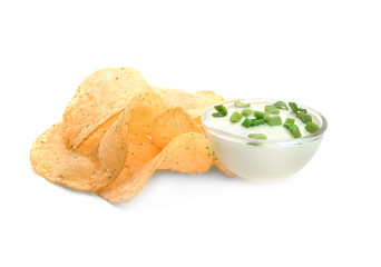 Potato chips and sour cream with onion in bowl on white background