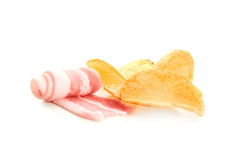 Potato chips and bacon on white background