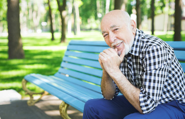 Smiling senior man outdoors