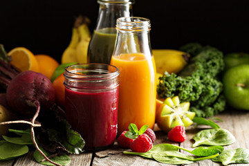 Fresh vegetable and fruit juices with beets, berries and greens