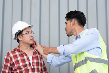 quarreling between angry engineer and construction worker