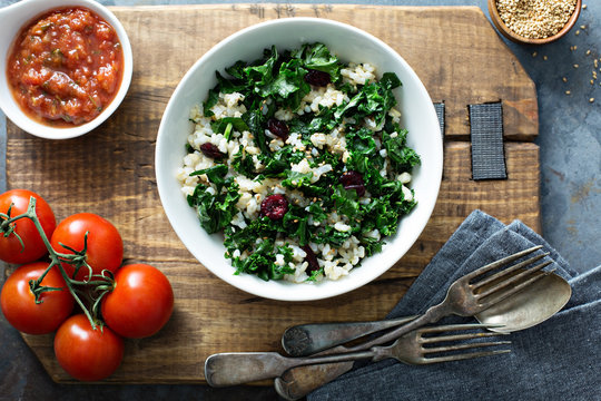 Warm kale salad with brown rice and cranberry