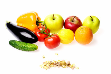 Capsules, fresh apples, citruses and vegetables.