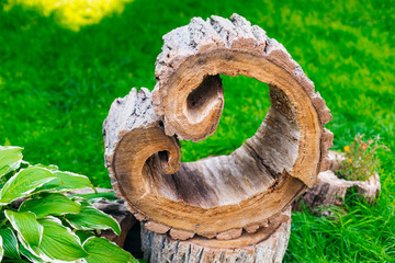beautiful wooden heart against a background of green grass