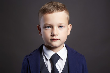 fashionable child in a three-piece suit