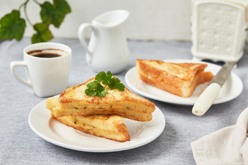 Grilled cheese sandwich  and a cup of coffee for breakfast
