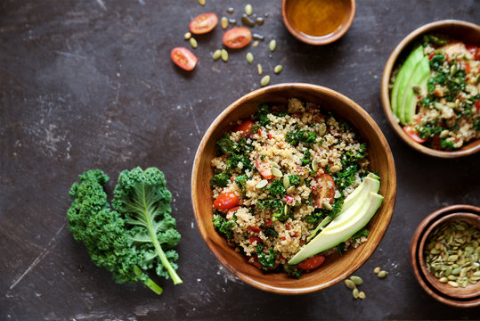 Quinoa salad with kale, cherry tomatoes and pumpkin seeds

