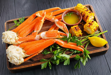 Crab legs, grilled corn in cobs