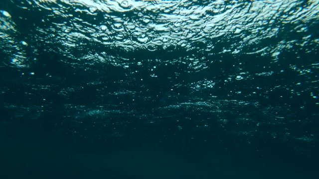 Tropical rain in the ocean (underwater view)
