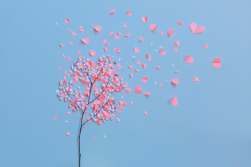 love tree with paper heart leaves on blue background. Concept Valentine"s day.