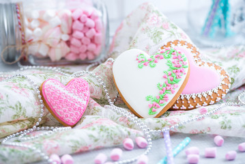 Gingerbread heart cookies on a fabric linen background. Valentine's Day concept. Free space copyspace for your text.