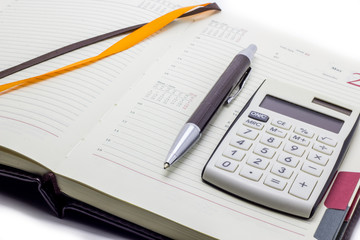 Diary with calculator and pen on white background, business manager set.