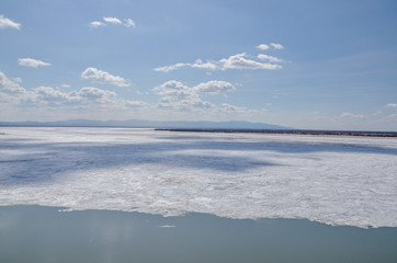 Kabelny and Big Ussuriysky islands and ice floes on Amur river on a sunny day in early spring  Admiral Nevelsky embankment, Khabarovsk, Russia