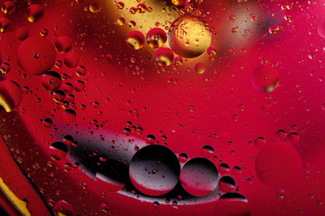Abstract space background. Water drops of different colours