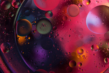 Abstract space background. Water drops of different colours