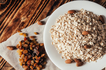 Step-by-step recipe for homemade oatmeal cookies with raisins and almonds