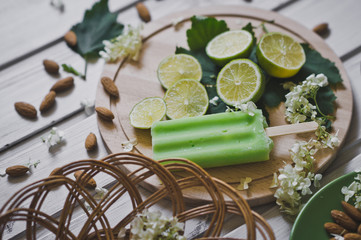 Dish with lemon and ice on a wooden table 446.