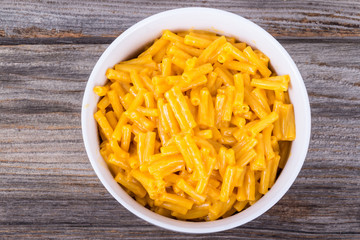 mac and cheese bowl on rustic table
