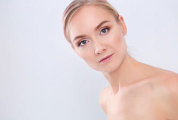 Obraz na płótnie Canvas Beautiful woman face portrait beauty skin care concept