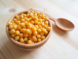 Chickpeas served in a wooden dish
