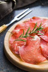 Sliced prosciutto crudo.