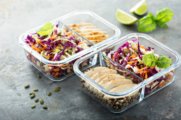 Healthy meal prep containers with quinoa and chicken