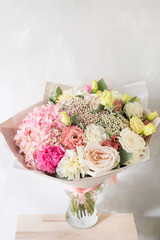 Bouquet in Foamiran paper. A simple bouquet of flowers and greens