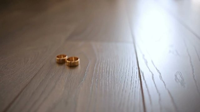 Wedding rings shine in the light